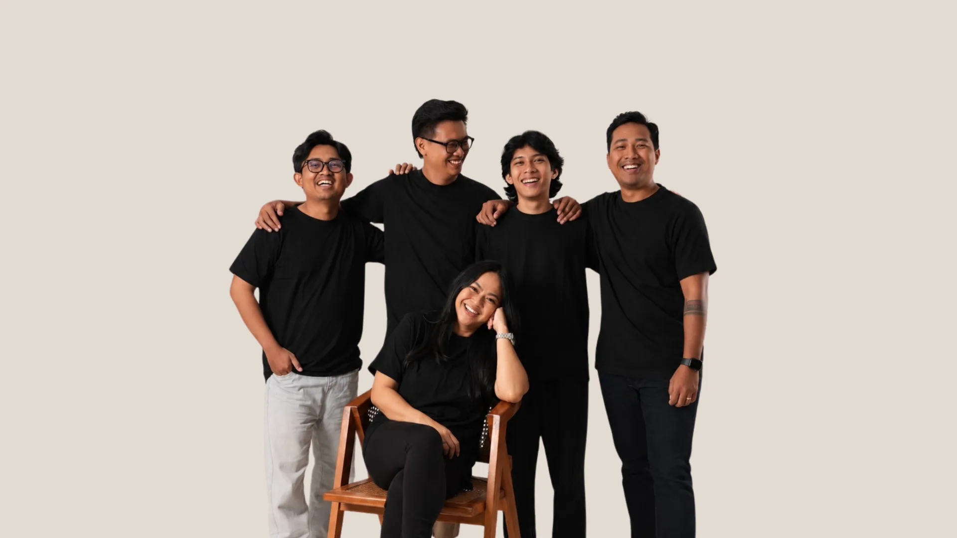 Interior design team collaborating in a bright minimalist Balinese studio.